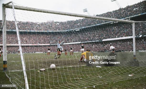 Scotland goalkeeper Alan Rough is beaten by a penalty by Argentina player Daniel Passarella during a friendly International between Argentina and...