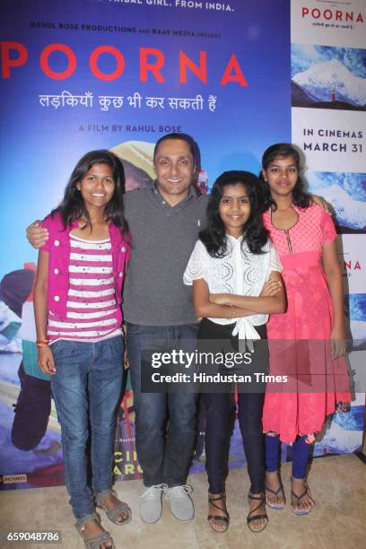 Mountaineer Poorna Malavath , Bollywood actor and producer Rahul Bose and Aditi Inamdar , who plays Poorna, during the screening of film ‘Poorna:...