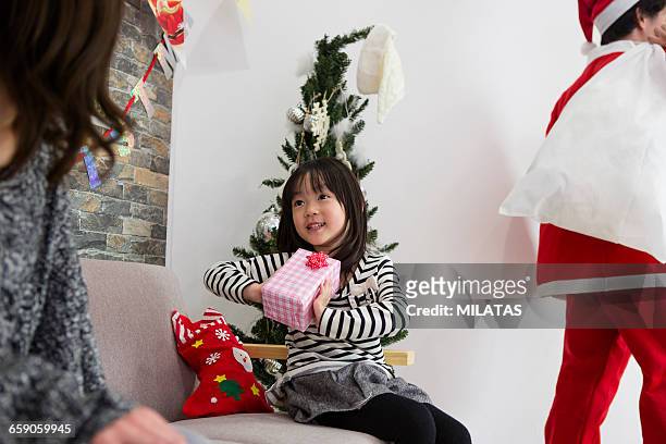 santa claus and the japanese mom and girl - japanese mother present ストックフォトと画像
