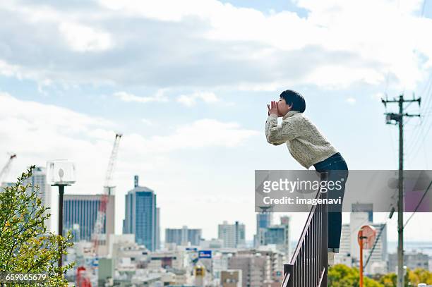 woman looking the town - kobe japan stock pictures, royalty-free photos & images