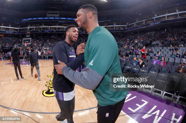 Buddy Hield of the Sacramento Kings greets Terrence Jones of the Milwaukee Bucks prior to the game on March 22, 2017 at Golden 1 Center in...