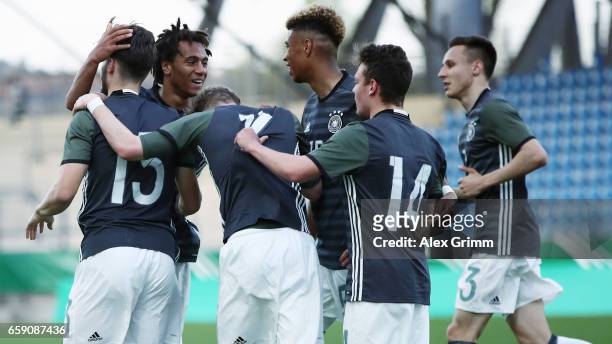 Etienne Amenyido of Germany celebrates his team's fourth goal with team mates during the UEFA Elite Round match between Germany U19 and Slovakia U19...