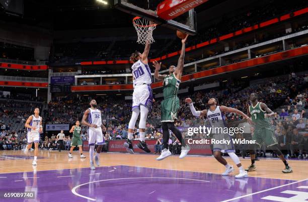 Terrence Jones of the Milwaukee Bucks shoots a layup against Willie Cauley-Stein of the Sacramento Kings on March 22, 2017 at Golden 1 Center in...