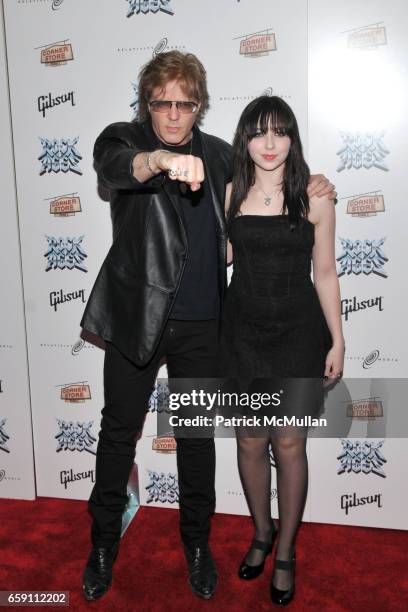 Jay Jay French and guest attend ROCK OF AGES Broadway Opening Theatre Arrivals at The Brooks Atkinson Theatre on April 7, 2009 in New York City.