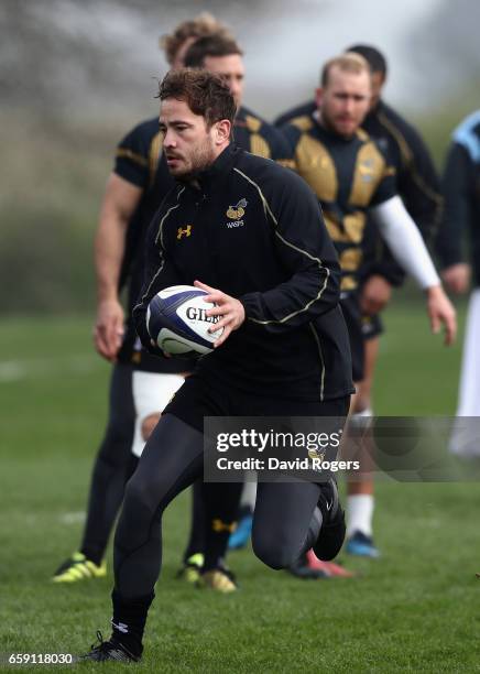 Danny Cipriani runs with the ball during the Wasps training session at Broadstreet RFC on March 28, 2017 in Coventry, England.