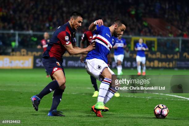 Nicolas Burdisso of Genoa CFC in action with Fabio Quagliarella of UC Sampdoria during the Serie A match between Genoa CFC and UC Sampdoria at Stadio...