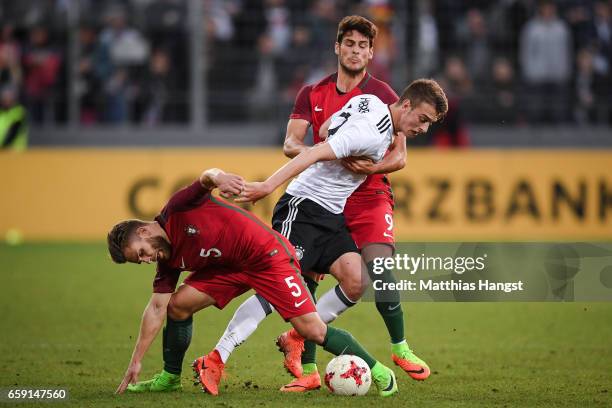 Kevin Rodrigues of Portugal, Janik Haberer of Germany and Gonzalo Paciencia of Portugal battle for the ball during the U21 International Friendly...