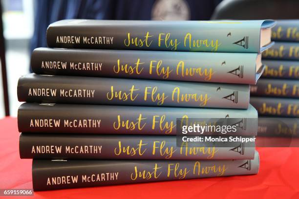 View of actor and author Andrew McCarthy's book "Just Fly Away" on display at The Moms In Conversation With Andrew McCarthy at Kmart on March 28,...
