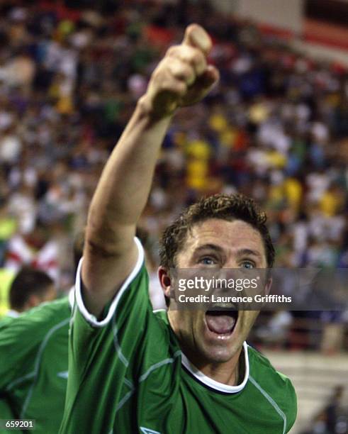 Robbie Keane of Ireland celebrates after scoring the equalising goal in the Group E match against germany at the World Cup Group Stage played at the...