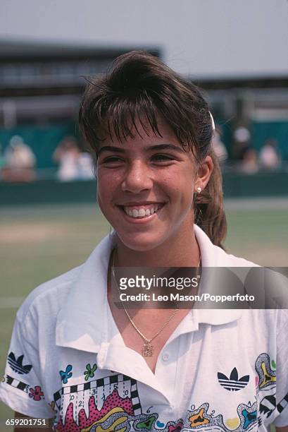 American tennis player Jennifer Capriati pictured during competition to win the Girls' Doubles tournament with Meredith McGrath at the Wimbledon Lawn...