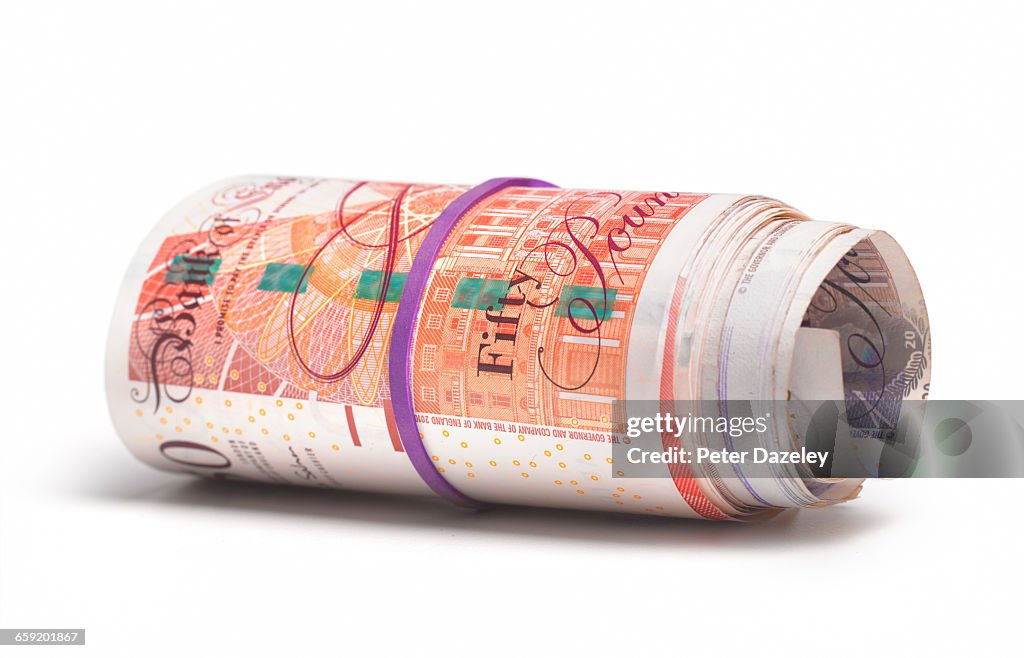 Roll of UK bank notes
