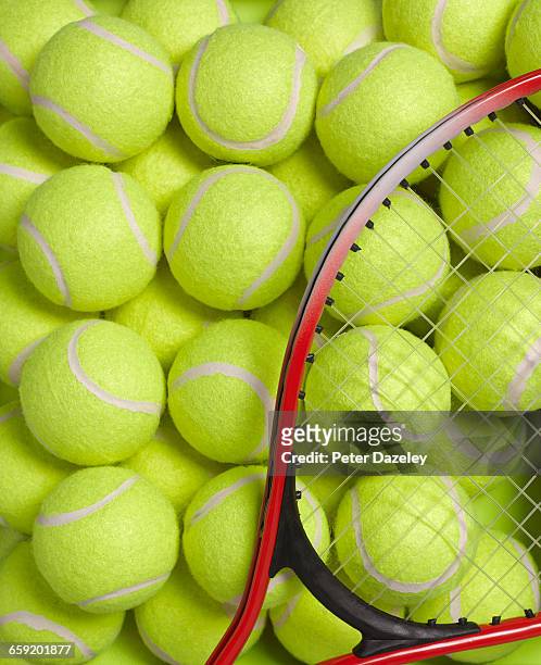 tennis balls and racket background - tennis ball stock pictures, royalty-free photos & images