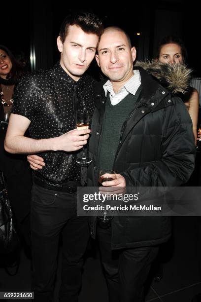 Cameron Moir and Rene Gonzalez attend MERCEDES-BENZ FASHION WEEK Opening Night Party at Shang at The Thompson LES Hotel on February 13, 2009 in New...