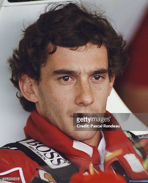 Portrait of Ayrton Senna of Brazil as he sits aboard the Honda Marlboro McLaren McLaren MP4/5 Honda V10 during practice for the Hungarian Grand Prix...