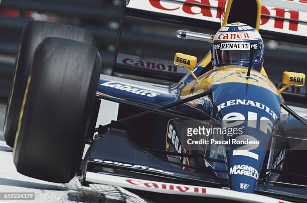 Alain Prost of France drives the Canon Williams Renault Williams FW15C Renault V10 during practice for the Grand Prix of Monaco on 22 May 1993 on the...