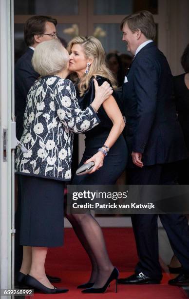 Queen Maxima and Princess Beatrix kissing goodbye after the ballet performance offered by the President of Argentie at theater Dilligentia on March...