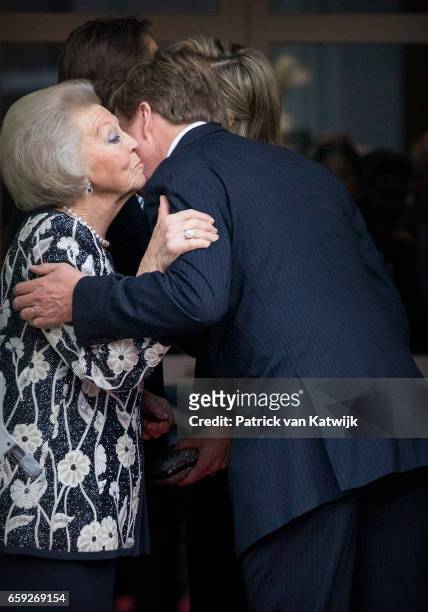 King Willem-Alexander and Princess Beatrix kissing goodbye after the ballet performance offered by the President of Argentie at theater Dilligentia...