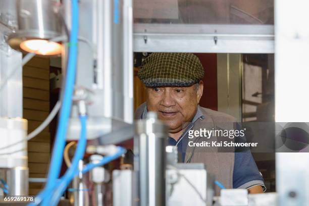 Malaya and Vietnam veteran David Rarere operates a poppy production machine designed and built in Christchurch at the Royal New Zealand Returned and...