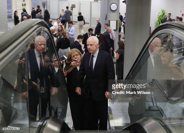 Sen. John McCain speaks to reporters before attending the Senate Republican policy luncheon, on March 28, 2017 in Washington, DC.