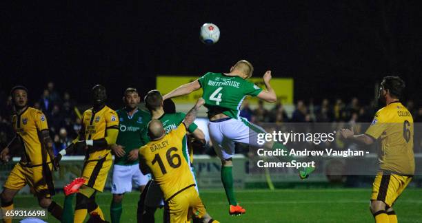 Lincoln City's Elliott Whitehouse scores the opening goal during the Vanarama National League match between Sutton United and Lincoln City at The...