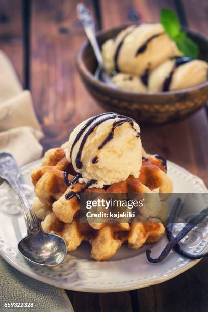 sweet belgian waffles with ice cream - belgium waffles stock pictures, royalty-free photos & images
