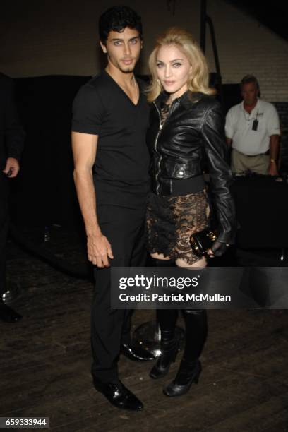 Jesus Luz and Madonna attend MARC JACOBS Spring 2010 Collection at NY State Armory on September 14, 2009 in New York City.