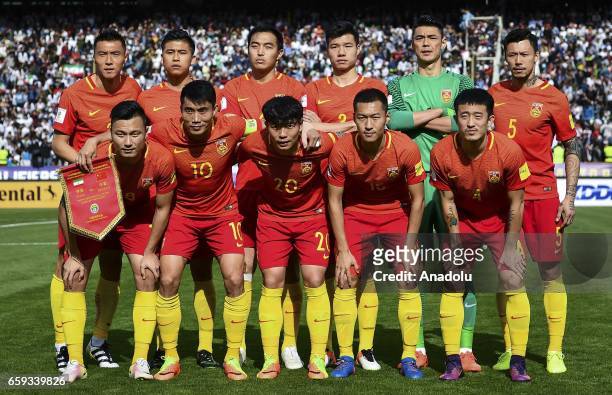 Players of China line up prior to the 2018 FIFA World Cup Qualifying group match between Iran and China at Azadi Stadium on March 28, 2017 in Tehran,...