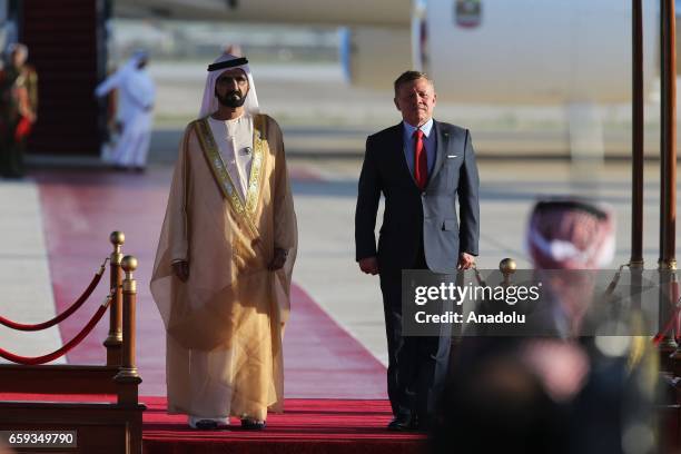 Vice President of the United Arab Emirates and Emir of Dubai, Sheikh Mohammed bin Rashid Al Maktoum is welcomed by Jordan's King Abdullah II with an...