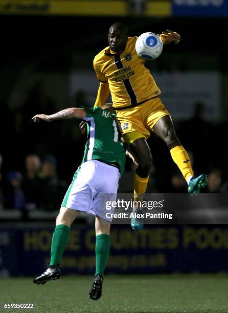 Bedsente Gomis of Sutton United wins a header during the Vanarama National League match between Sutton United and Lincoln City at Gander Green Lane...