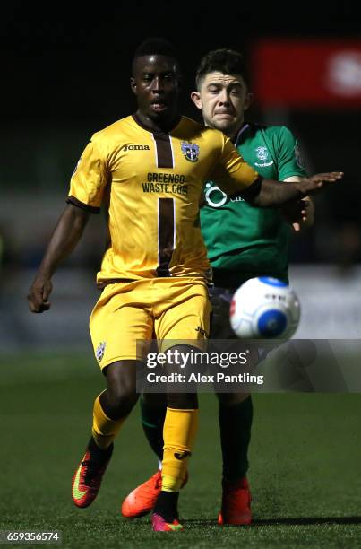 Kevin Amankwaah of Sutton United and Sam Habergan of Lincoln City in action during the Vanarama National League match between Sutton United and...