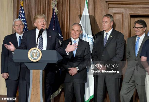 President Donald Trump speaks before signing an energy independence executive order as U.S. Vice President Mike Pence, from left, Scott Pruitt,...