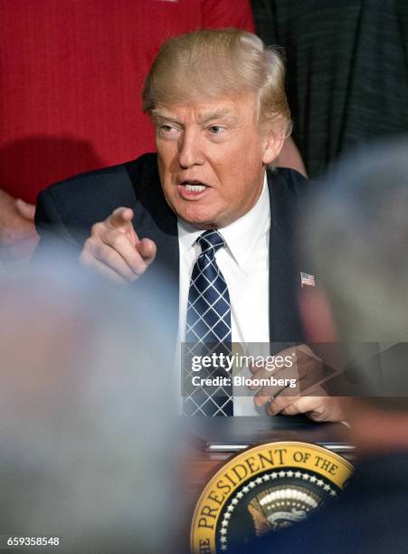 President Donald Trump speaks after signing an energy independence executive order at Environmental Protection Agency headquarters in Washington,...