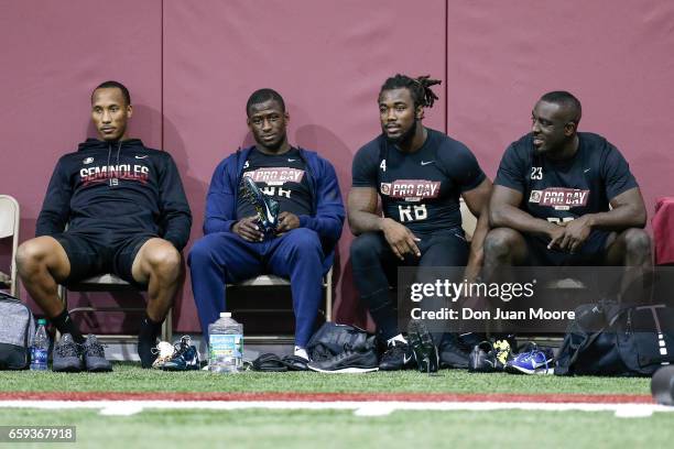 Wide Receivers Travis Rudolph, Jesus "Bobo" Wilson, Runningbacks Dalvin Cook and Freddie Stevenson before their work out with NFL Scouts and Coaches...