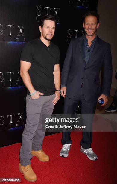 Actor Mark Wahlberg and director Peter Berg at CinemaCon 2017 The State of the Industry: Past, Present and Future and STX Films Presentation at The...