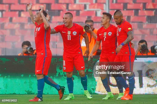 Esteban Paredes of Chile celebrates with Eduardo Vargas, Alexis Sanchez and Arturo Vidal after scoring the third goal of his team during a match...