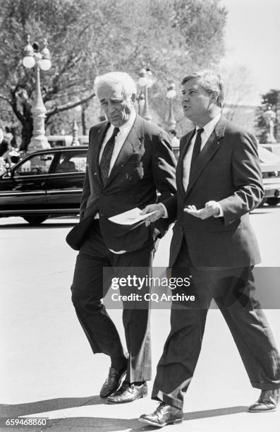 Sen. Frank Lautenberg, D-N.J. And Sen. Bob Graham, D-Fl. During Heinz tribute, leaving the bus on April 11, 1990. "r"n