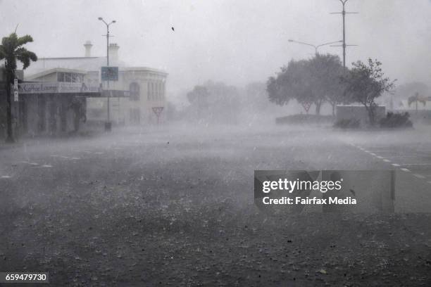 Category 4 Cyclone Debbie bears down on north Queensland - the town of Bowen is deserted and lashed by winds and rains before for the full force of...