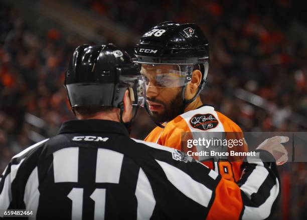 Referee Kelly Sutherland instructs Pierre-Edouard Bellemare of the Philadelphia Flyers during the game against the Ottawa Senators at the Wells Fargo...