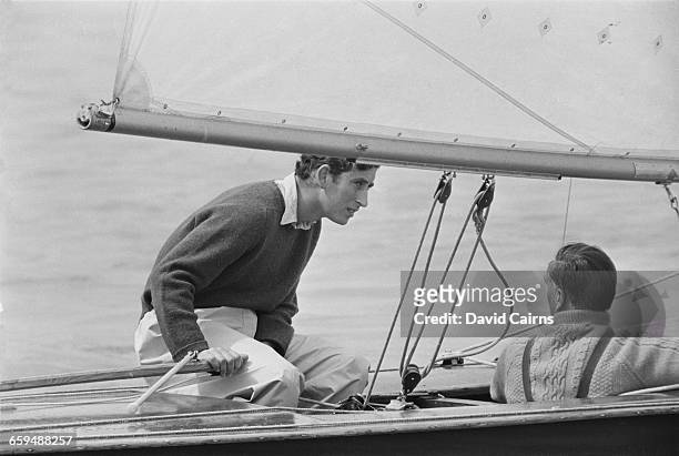 Prince Charles at the helm of his 20ft Flying Fifteen yacht 'Coweslip', in a handicap race off the Isle of Wight during the Cowes Week regatta, 3rd...