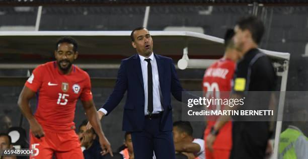 Venezuela's coach Rafael Dudamel gestures during their 2018 FIFA World Cup qualifier football match against Chile in Santiago, Chile on March 28,...