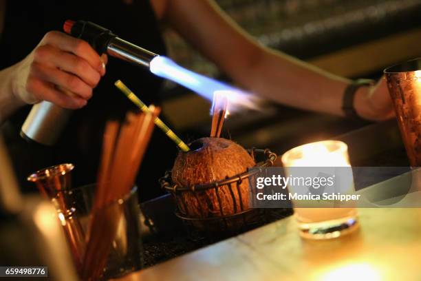 Coconut cocktail being prepared at the Sugar East Grand Opening on March 28, 2017 in New York City.