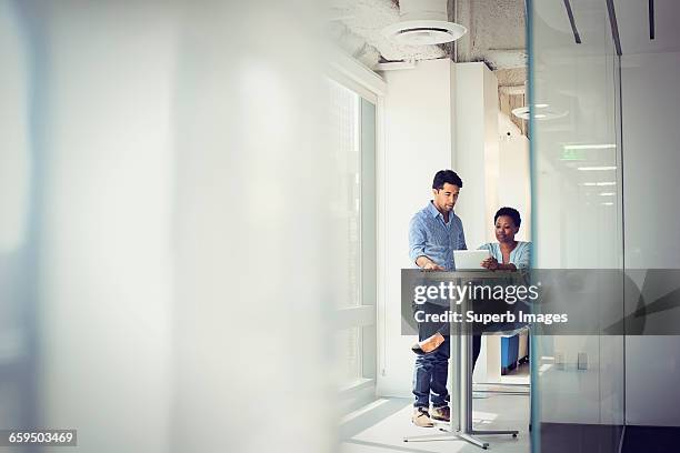 business meeting in office - blue trousers stock-fotos und bilder