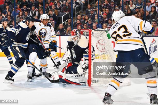 Goaltender Sergei Bobrovsky of the Columbus Blue Jackets blocks a shot by Tyler Ennis of the Buffalo Sabres during the second period of a game on...