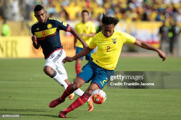 Arturo Mina of Ecuador and Miguel Borja of Colombia vie for the ball during a match between Ecuador and Colombia as part of FIFA 2018 World Cup...