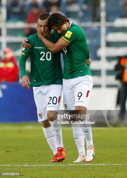 Marcelo Moreno of Bolivia celebrates with teammate Pablo Escobar after scoring the second goal of his team during a match between Bolivia and...