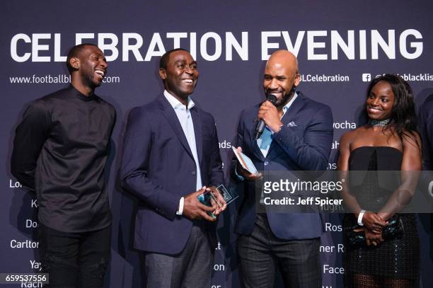 Andy Cole receives the Keith Alexander Award. Pictured with Yannick Bolasie , Jonathan Joseph and Eniola Aluko at the Football Black List 2016 at...