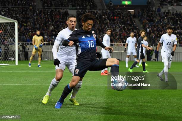 Shinji Kagawa of Japan controls the ball during the 2018 FIFA World Cup Qualifier match between Japan and Thailand at Saitama Stadium on March 28,...