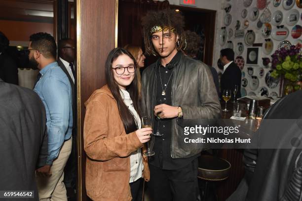 Kirsten Tanjutco and Roberto Rossellini attend the Oliver Peoples Pour Berluti Launch Celebration at Sant Ambroeus SoHo on March 28, 2017 in New York...