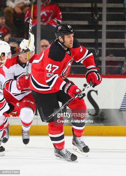 Dalton Prout of the New Jersey Devils skates in the first-period against the Carolina Hurricanes during the game at Prudential Center on March 25,...