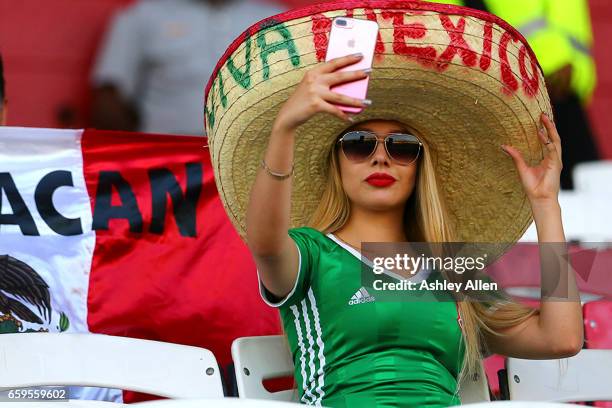 Fan of Mexico poses for a selfie prior the fifth round match between Trinidad & Tobago and Mexico as part of the FIFA 2018 World Cup Qualifiers at...